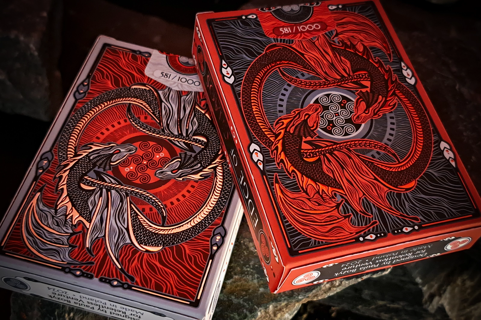 Edge of Chaos: two decks of cards teetering on the brink of two opposing powers.