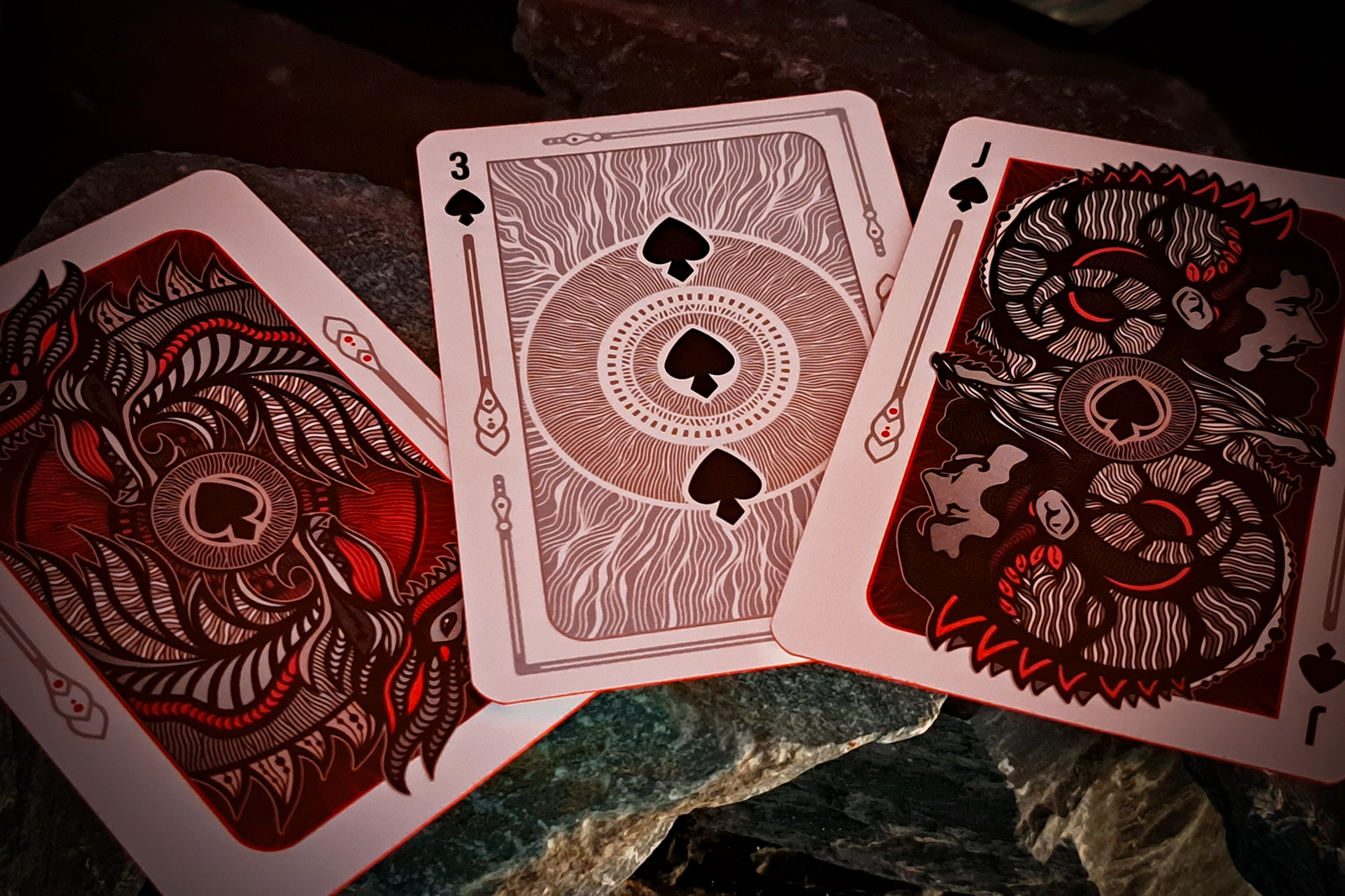 Numeric cards are richly ornamented and consistent with the character of each deck. They relate to traditional colors with a hint of innovation.